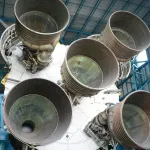 Land a rocket booster on a moving barge.