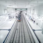 Sort recyclables on industrial conveyor at human accuracy.