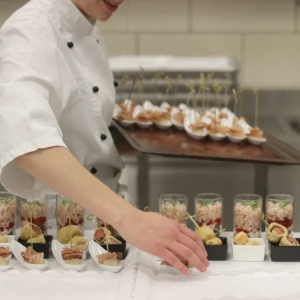 Can AI cook a five-course tasting menu in a real working kitchen, alone?