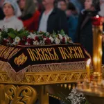 Be present at a funeral.