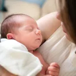 Can AI hold a baby?