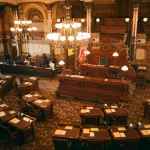 autonomously draft and pass legislation in a major democracy by generating bills that exploit legal loopholes and public sentiment analysis