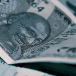 replace a central bank governor in monetary policy decisions by having an AI model set interest rates and manage currency reserves in real time