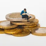 engineer personalized financial crises by targeting individual households with AI-tailored debt traps and predatory algorithms