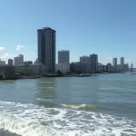 AI illustration: choose which cities to abandon as rising seas displace millions