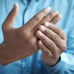 predict rheumatoid arthritis exacerbations from voice tremors detected in phone calls?