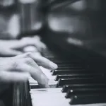 improvise a jazz solo indistinguishable from a human musician in a live performance