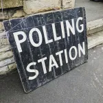 predict the outcome of a country’s national election based on social media sentiment and economic indicators