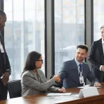 negotiate a corporate merger between two Fortune 500 companies in real time using email and video calls?